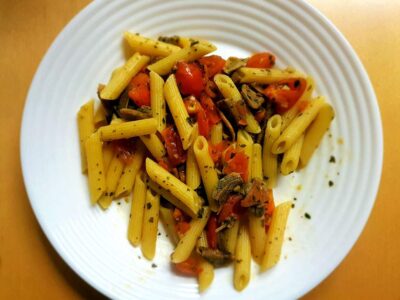 Pasta with mushrooms and cherry tomatoes, an autumn dish