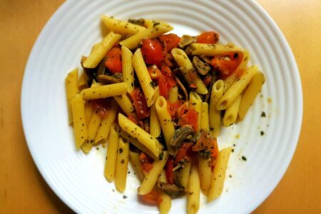 Pasta with mushrooms and cherry tomatoes, an autumn dish