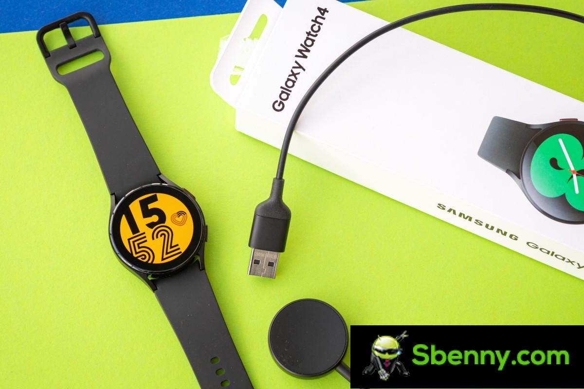 Samsung Galaxy Watch4 with its charger