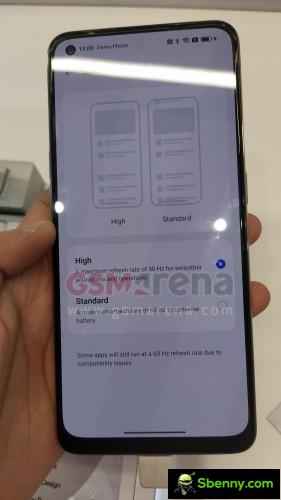Oppo Reno8 T 4G Sunset Orange model poses for the camera, revealing the main specifications
