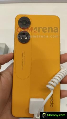 Oppo Reno8 T 4G Sunset Orange model poses for the camera, revealing the main specifications